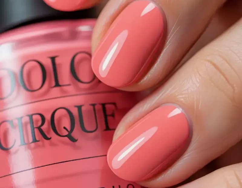 Matte coral pink nail polish on long oval nails – obsessed with this shade!