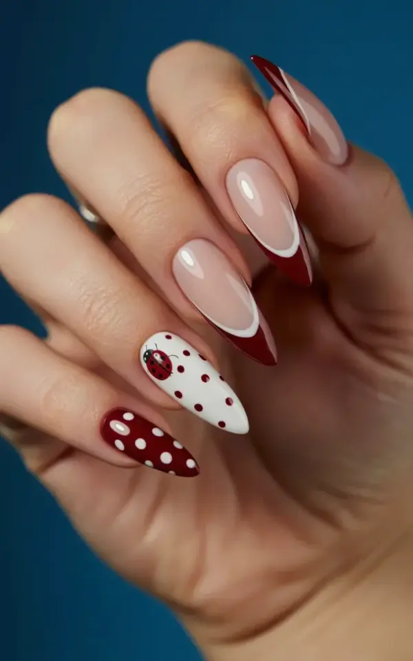 Cozy Fall Stiletto Nails: Burgundy Tips, White Dots & a Tiny Ladybug